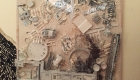Foto JAW-Kunstaktion "Recycling" weiß übermalte Collage aus Abfallmaterial